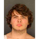 This image provided by the Erie County District Attorney’s Office shows Payton Gendron. Authorities say the white 18-year-old who killed 10 people at a Buffalo supermarket during a rampage that targeted Black people had previously made a threat at his high school. But they say Gendron was never charged with a crime and had no further contact with law enforcement after his release from a hospital.